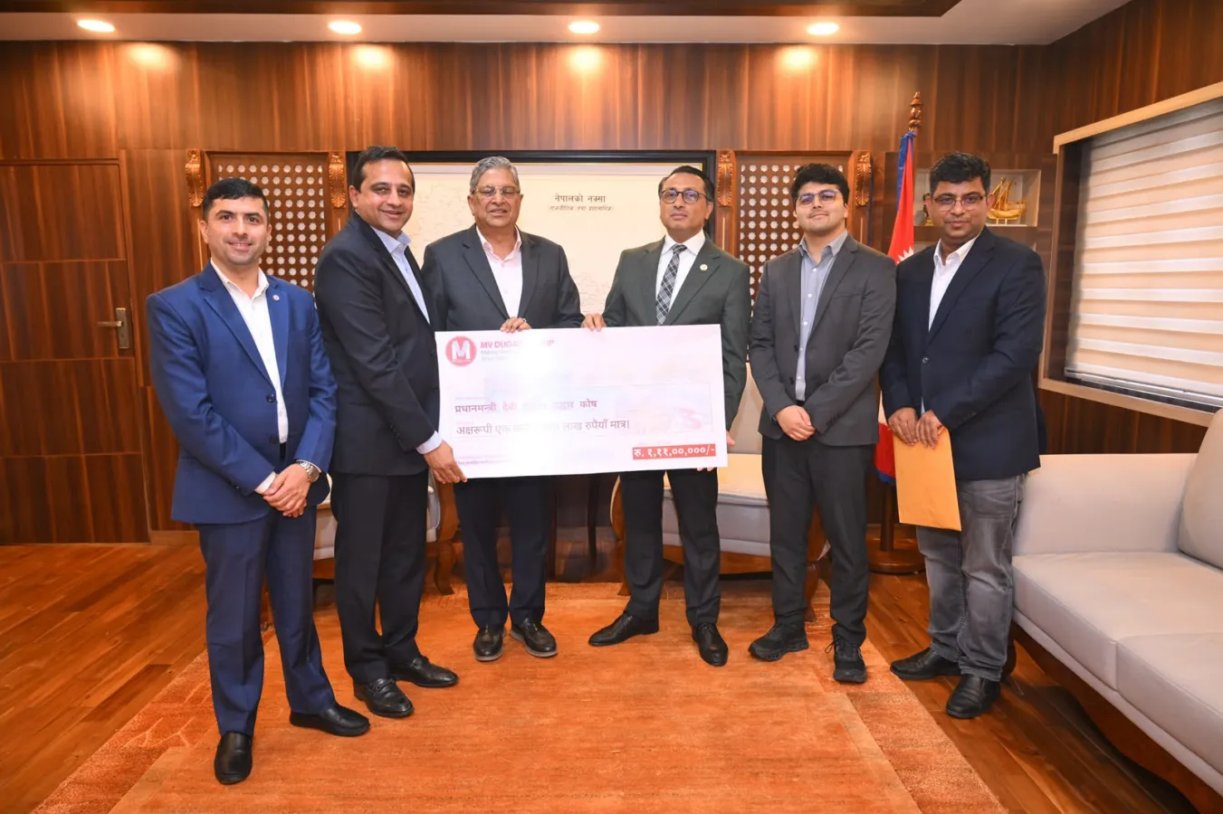 एम.भी. दुगड ग्रुपद्वारा प्रधानमन्त्री दैवी प्रकोप उद्धार कोषमा १ करोड ११ लाख सहयोग